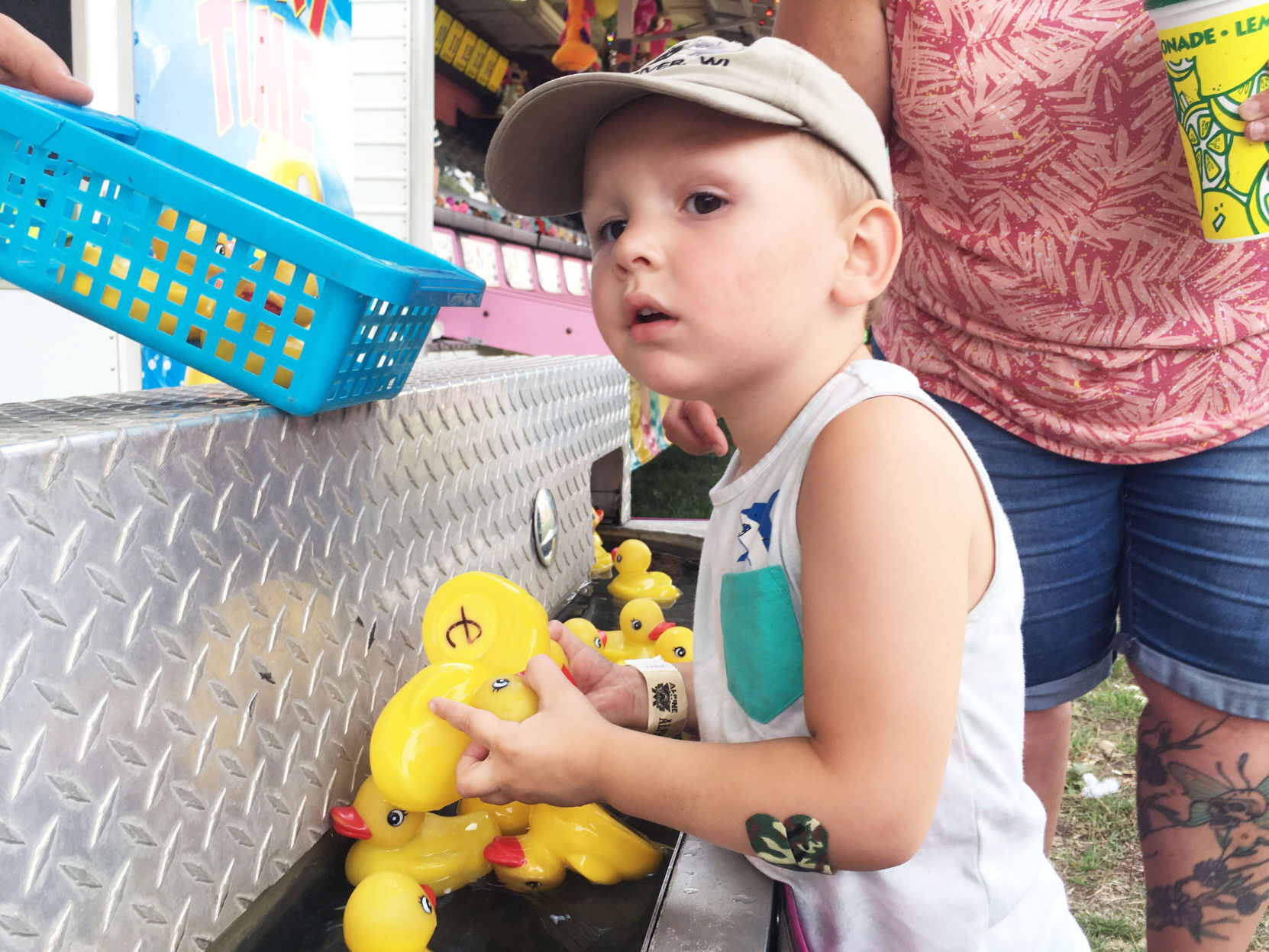 Jackson Spiering, 2, plays the duck pond game at Lions Fun Fest in Waterford